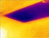 Thermal image of uninsulated attic trap door